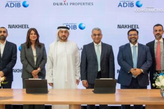 Dubai Holding Real Estate ADIB partnership